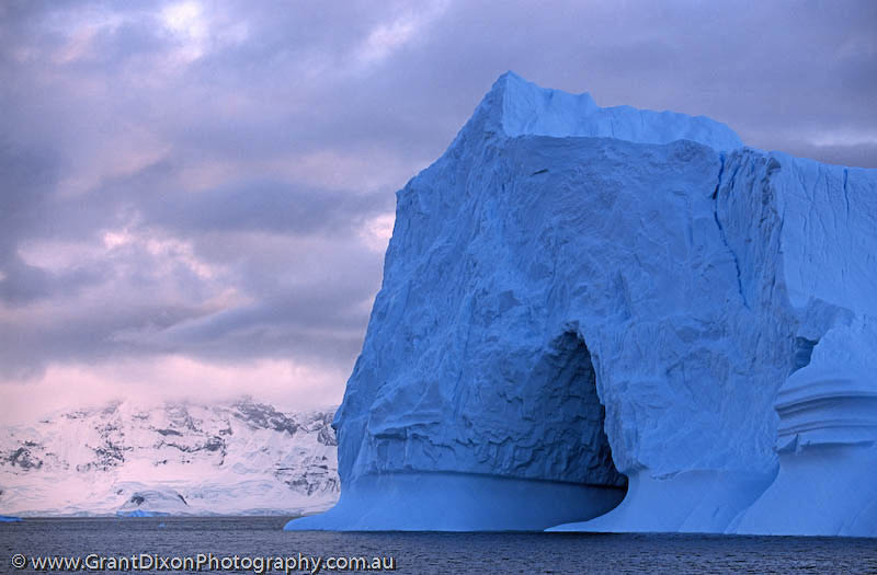 image of Blue iceberg with cave