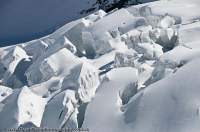 INDIA, Uttaranchal, Govind National Park. Seracs in icefall beneath Kalanag (6387m) peak.