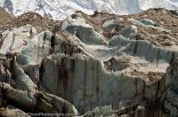 INDIA, Uttaranchal, Gangotri. Terminal ice cliffs of Gangotri Glacier at Gaumukh, glacial source of Bhagirarthi River, main tributory of Ganges and destination of a Hindu pilgrimage.