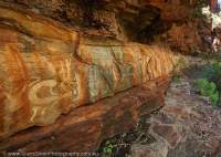 Aboriginal petroglyphs on dolomite bed, Kalamina Gorge, Hamersley Range, Karijini National Park, Western Australia.