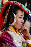Woman in traditonal costume, with turquoise-decorated headgear, Ladakh Festival, Leh, 2013