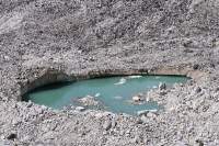 Meltwater pool on Salpudanda Glacier, Manaslu Circuit trek, Nepal