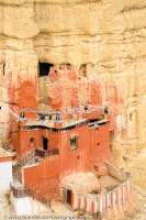 NEPAL. Buddhist monastery built into cliff face, Mustang.