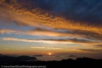 AUSTRALIA, Tasmania, Southwest National Park, World Heritage Area. Dawn sky over south coast and islands.