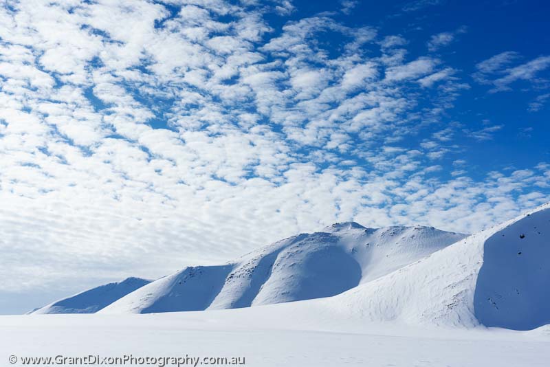 image of Breaking cloud over glacier