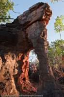 AUSTRALIA, Western Australia, West Kimberley. Eroded sandstone tor near Bachsten Creek, sunrise.