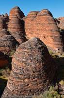AUSTRALIA, Western Australia, East Kimberley, Purnululu National Park (Bungle Bungles).  Layered sandstone domes beside Piccanniny Creek.