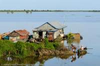 CAMBODIA, Siem Reap. Houses on outskirts of floating village of Chong Kneas, Tonle Sap lake.