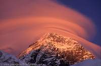 NEPAL, Himalaya, Mt Everest. Wind-formed clouds over the summit of Mt Everset at sunset.
