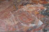AUSTRALIA, Northern Territory, Top End, Kakadu National Park. Aboriginal rock art of X-ray style beneath rock overhang at Ubirr.