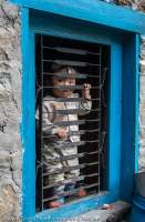 Curious child in window, Tsum Valley, Manaslu Circuit, Gorkha, Nepal