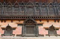NEPAL. Bhaktapur, Kathmandu valley. Carved wooden windows on facade of 55 Window Palace, Durbar Square.