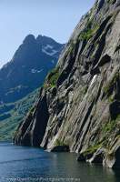 NORWAY, Nordland. Lofoten Islands, Austvagoy. Steep gneiss bedrock walls in Trollfjord.