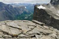 NORWAY, Northern fjords, Trolltindene. Rock slabs & bluffs above Rauma valley.