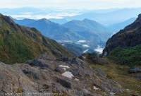 Tarn in glacial cirque above Sepik catchment, Mt Scorpio, Star Mountains, Papua New Guinea.