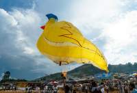 Launching animal balloon at 2014 fire (hot air) balloon festival in Taunggyi, part of full-moon celebrations during Tazaungmon (Tazaungdaing).