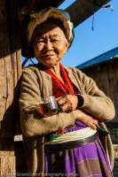 Old Palaung woman drinking tea, northern Shan Highlands.