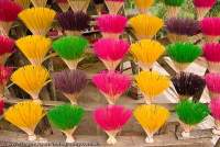 VIETNAM, Central, Hue. Freshly-made incense sticks displayed ready for sale.
